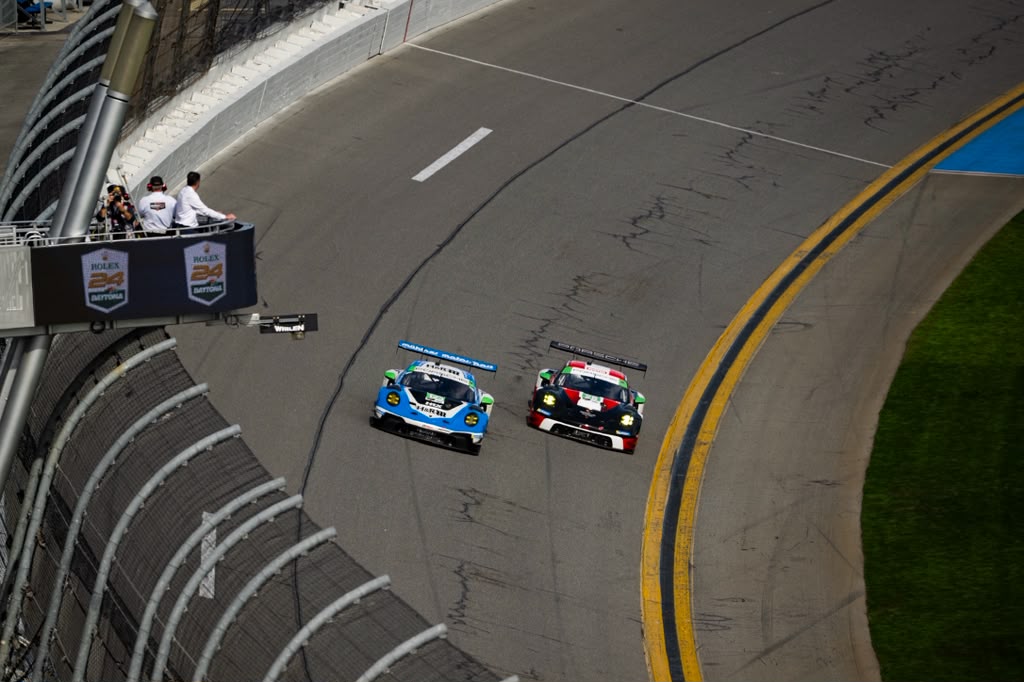 GT race cars competing on the Daytona banking